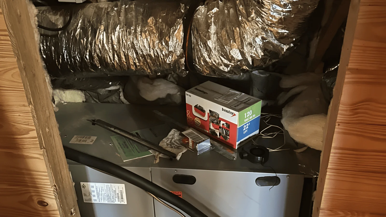Heat pump air handler with insulated flex ductwork and vapor barrier in attic installation
